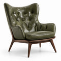 Poltrona in pelle verde con struttura in legno